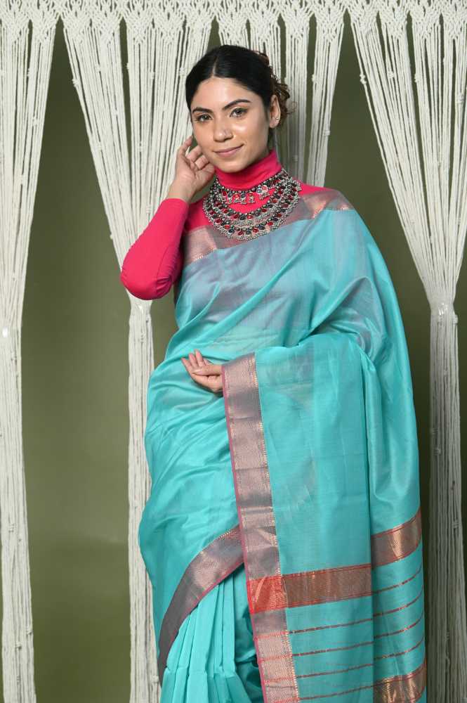 Turquoise Cotton Silk Saree With Golden Border